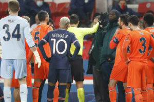 PSG and Istanbul Basaksehir players leave the field after alleged racial slur by official